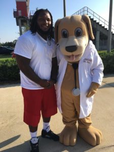 Upshaw Football Camp and Mascot of MainStreet Family Urgent Care