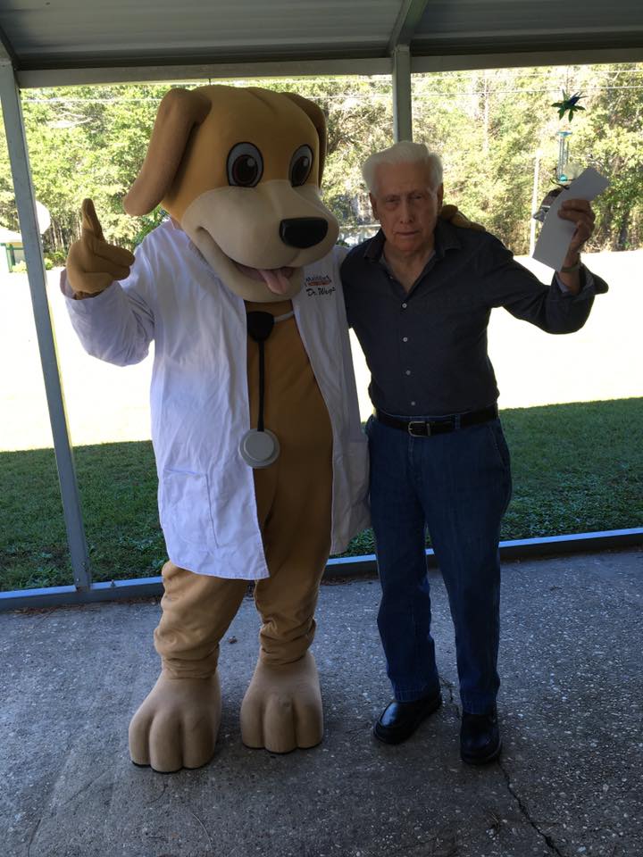 MainStreet Mascot posed with veteran