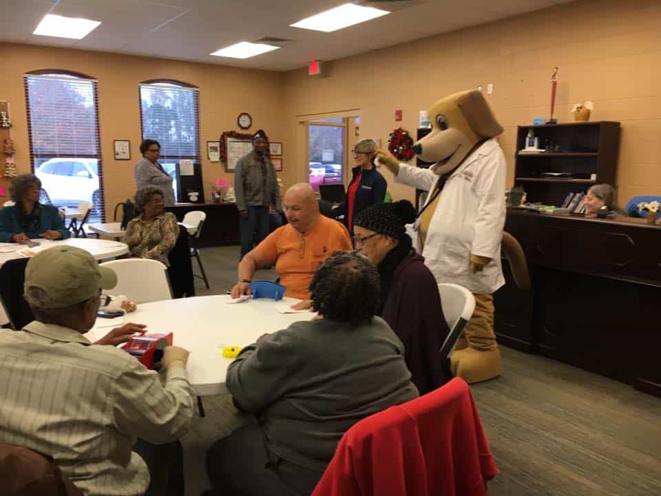 Mainstreet eufaula urgent care with mascot at senior center near community center