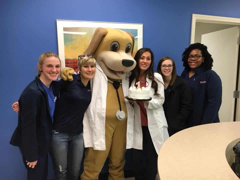 Dr. Wags With Clinic Staff At One Year Anniversary Party
