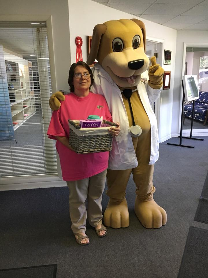Mother's Day giveaway winner takes pics with MainStreet Mascot and prize in May