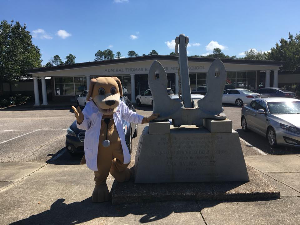 MainStreet Mascot Donated folders to Admiral Moorer Middle School classes