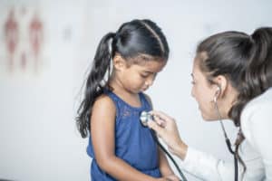 checkup little girl and provider