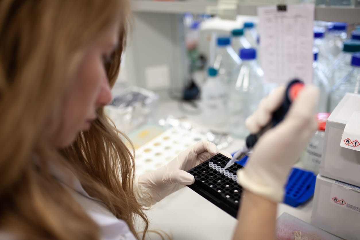 Scientist Conducting Research in Chemical Lab. Scientist Working in Lab