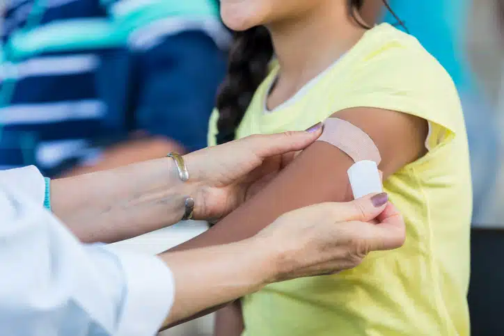 bandaid applied after flu shot