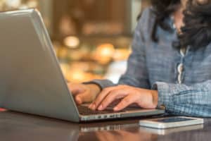 Patient accesses MainStreet Patient Portal using laptop