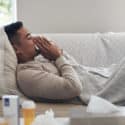 man on the couch with the cold or flu