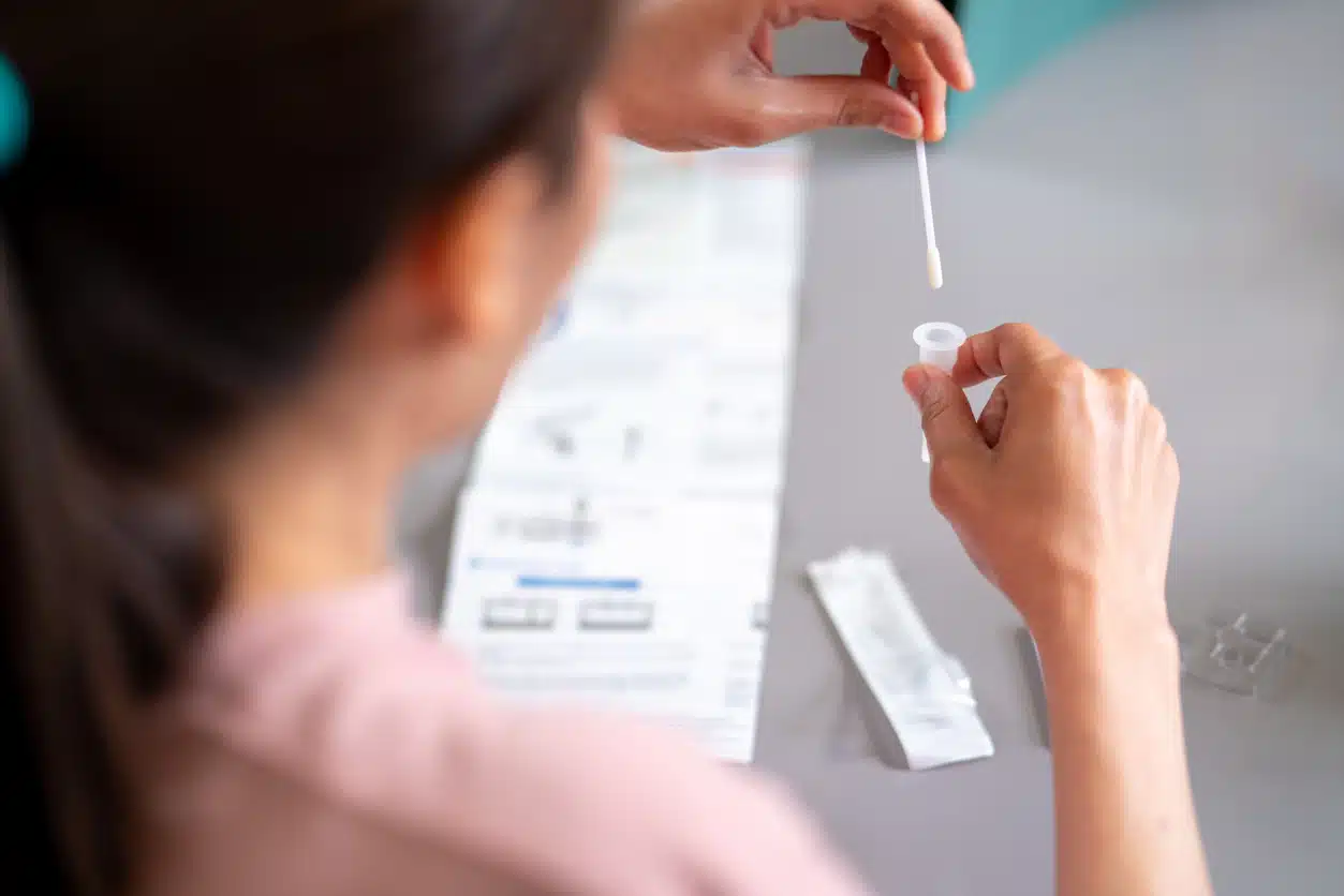 nurse performing common upper respiratory lab tests