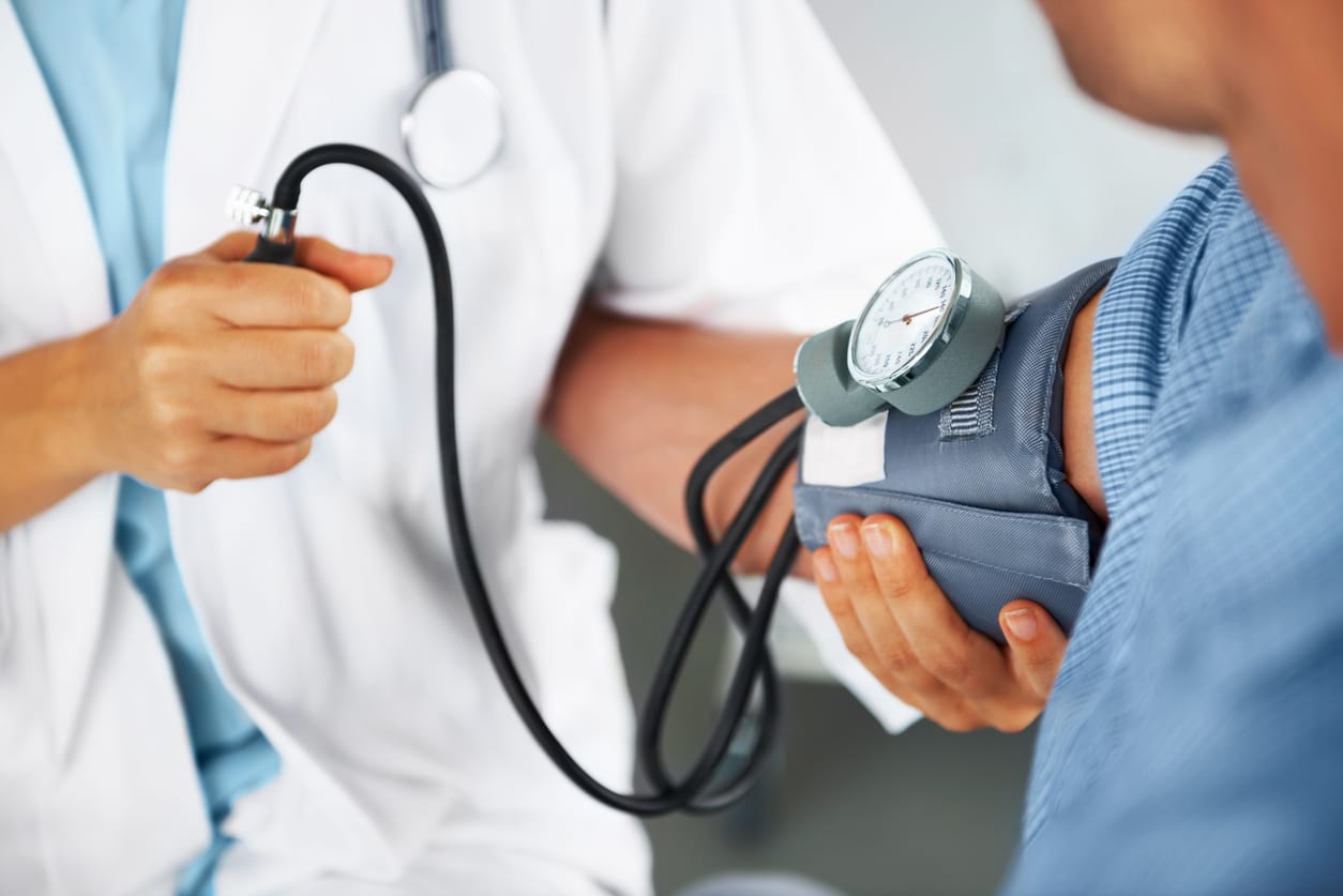 primary care provider (PCP) checking blood pressure
