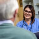 Primary Care vs. Urgent Care nurse with an older patient