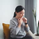 Woman sick with strep throat symptoms