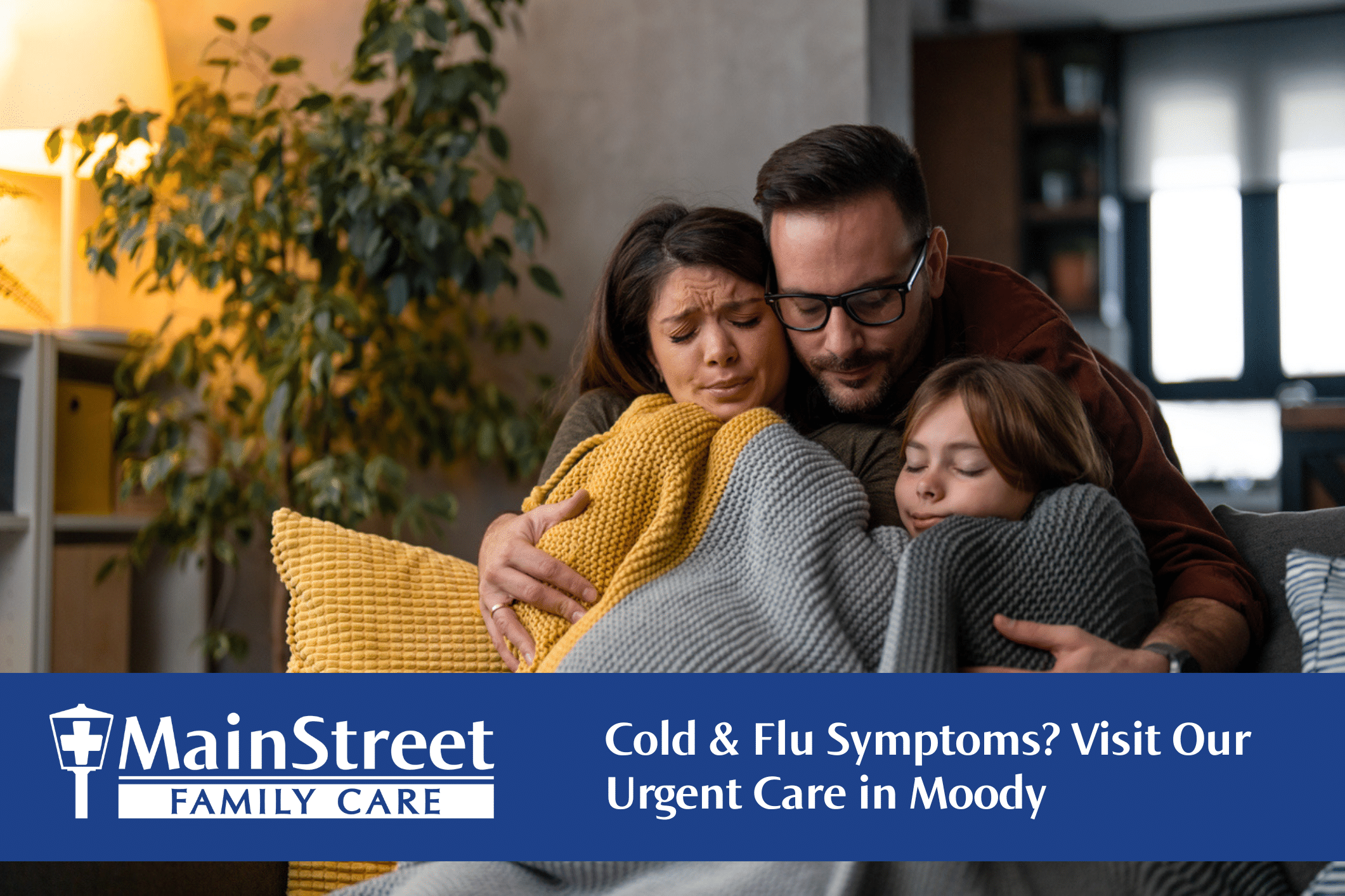 family on the couch sick with a cold or the flu