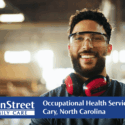 Worker with safety glasses on. Featured image for Occupational Health Services in Cary, North Carolina blog post.