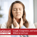 Woman holding her throat, sick. Featured image for Cough, Congestion, and Sore Throat: When to Get Care blog post