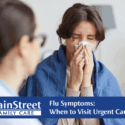 Person sneezing. Featured image for Flu Symptoms: When to Visit Urgent Care